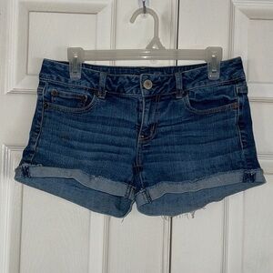 American Eagle Medium Wash Stetch Raw Hem Shorts
